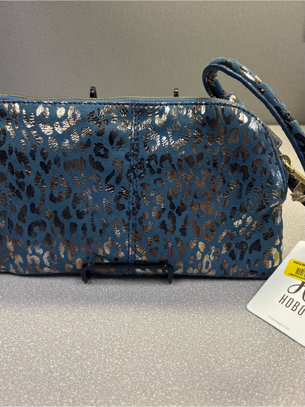HOBO INTERNATIONAL Sable Blue Cheetah Metallic Accent Wristlet